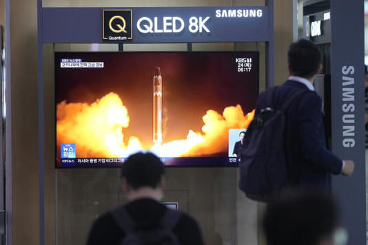 A TV screen shows a report of North Korea's rocket launch with file image during a news program at the Seoul Railway Station in Seoul, South Korea, Thursday, Aug. 24, 2023. (Lee Jin-man / Associated Press)