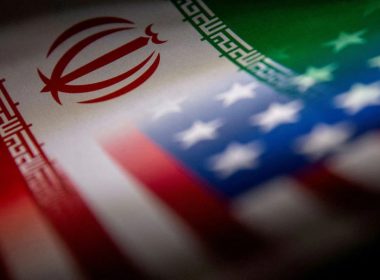 Iran's and U.S.'s flags are seen printed on paper in this illustration taken January 27, 2022. REUTERS