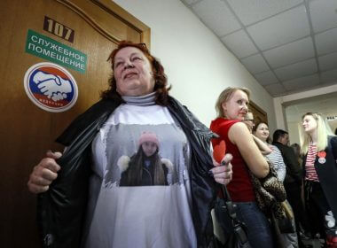 A supporter wears a T-shirt with a picture of Masha Moskaleva during a court hearing in Russia in April. Yuri Kochetkov/EPA-EFE