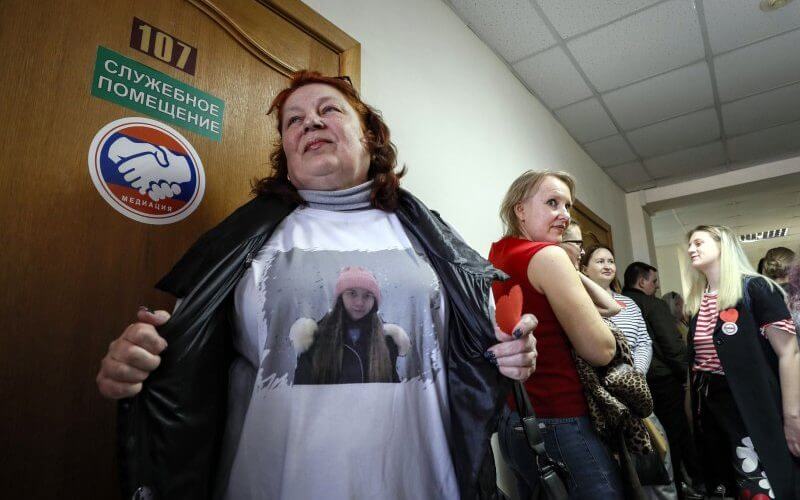 A supporter wears a T-shirt with a picture of Masha Moskaleva during a court hearing in Russia in April. Yuri Kochetkov/EPA-EFE