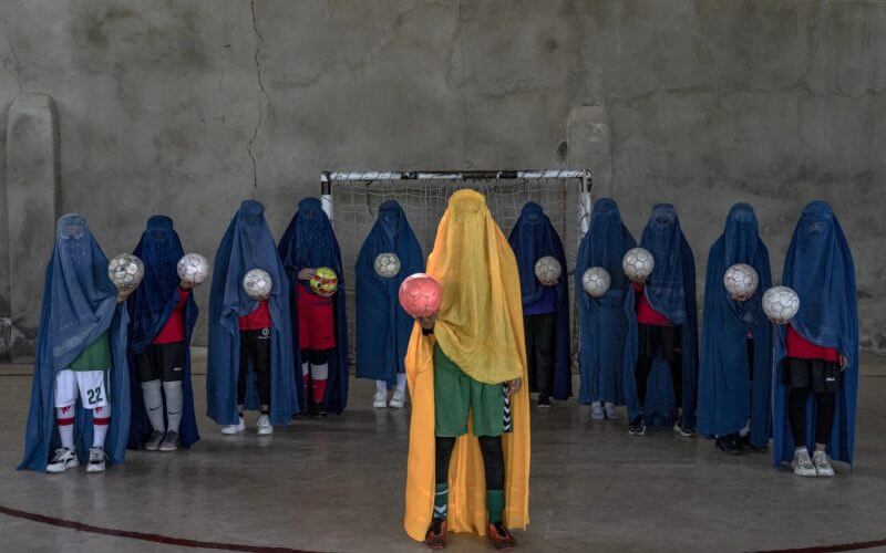 An Afghan women's soccer team poses for a photo in Kabul, Afghanistan, Thursday, Sept. 22, 2022. (AP Photo/Ebrahim Noroozi, File)