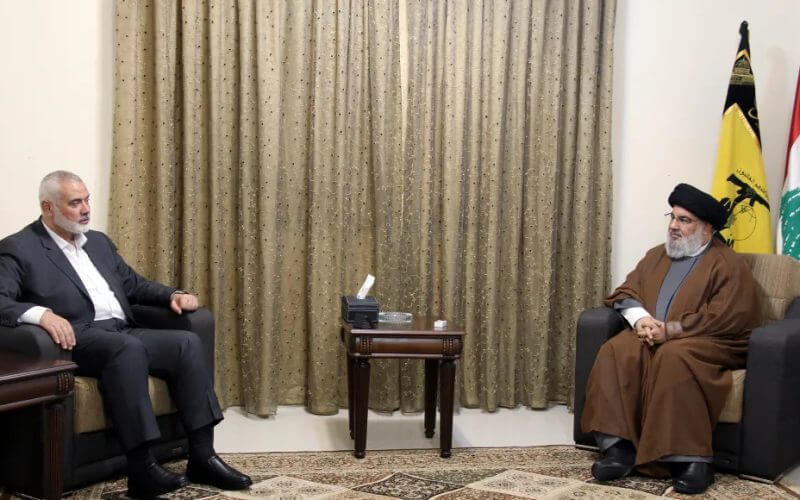 Hezbollah leader Sayyed Hassan Nasrallah (R), meeting with Ismail Haniyeh, the leader of the Palestinian terrorist group Hamas, in Beirut, Lebanon. Hezbollah Media Relations Office, via AP