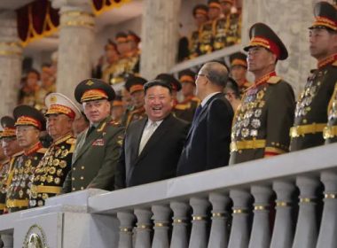 North Korean leader Kim Jong Un, Chinese Communist Party politburo member Li Hongzhong, and Russian Defense Minister Sergei Shoigu attend a military parade to commemorate the 70th anniversary of the Korean War armistice in Pyongyang, North Korea, on July 27, 2023. (KCNA via Reuters)