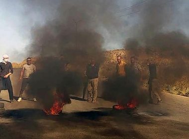 In this photo released by Suwayda24, people stage a protest in the southern city of Sweida, Syria, Tuesday, Aug 22, 2023. (Suwayda24 via AP)