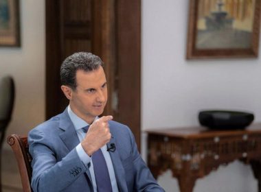 In this photo released on the official Telegram page of the Syrian Presidency, Syrian President Bashar Assad speaks during an interview in Damascus, Syria, Wednesday, Aug. 9, 2023. (Syrian Presidency Telegram page via AP)