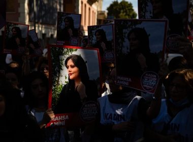 Protestors hold banners with the portrait of Mahsa Amini during a rally outside the Iranian consulate in Istanbul, Turkey last month.Yasin Akgul / AFP - Getty Images