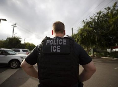 U.S. Immigration and Customs Enforcement (ICE) agent. Gregory Bull/AP