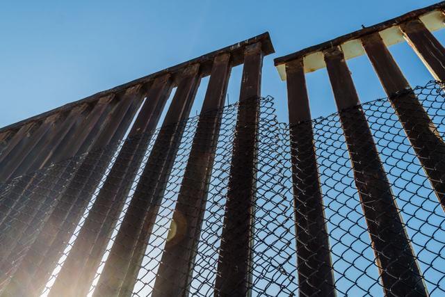 A section of the border fence separating San Diego, California and Tijuana, Mexico. Sherry V Smith / Shutterstock