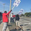Earlier this week, auto workers and their families strike along Michigan Avenue in front of the Michigan Assembly Plant in Wayne, Michigan. thecentersquare.com