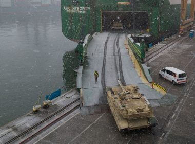 Abrams tank from U.S. 2nd Armored Brigade Combat Team (ABCT) is unloaded as it arrived in the Polish port of Gdynia as part of NATO's Operation Atlantic Resolve in Gdynia, Poland December 3, 2022. REUTERS