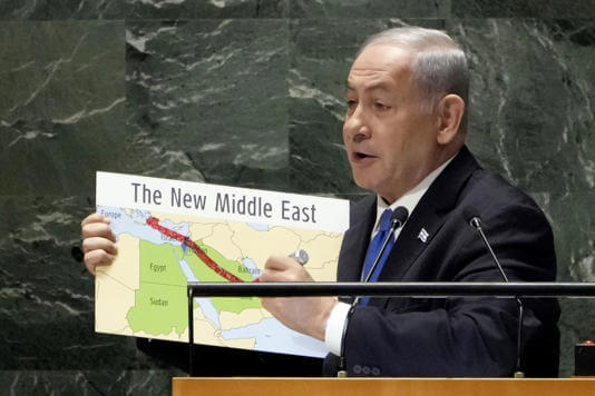 Israel's Prime Minister Benjamin Netanyahu uses a red marker on a map as he addresses the 78th session of the United Nations General Assembly, Friday, Sept. 22, 2023. (AP Photo/Richard Drew)