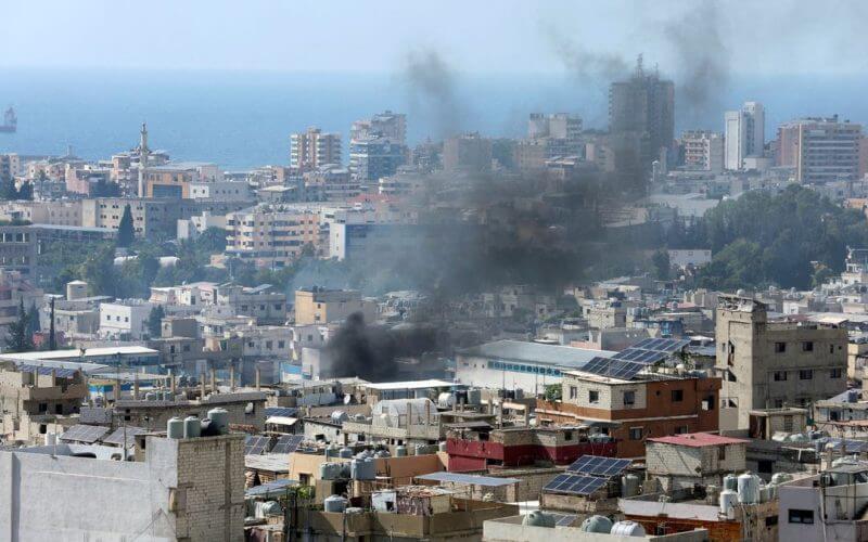 Smoke rises from Ain el-Hilweh Palestinian refugee camp during a previous round of Palestinian factional clashes, in Sidon, Lebanon, July 30, 2023. REUTERS