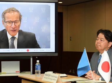 International Atomic Energy Agency Director General Rafael Mariano Grossi, seen on screen, talks with Japanese Foreign Minister Yoshimasa Hayashi, right, during a video conference at the foreign ministry Friday, Aug. 25, 2023, in Tokyo. (AP Photo/Norihiro Haruta)