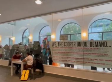 Pro-Palestinian protesters rallied, pushed posters against the glass, and banged on the doors of the Cooper Union library. twitter.com