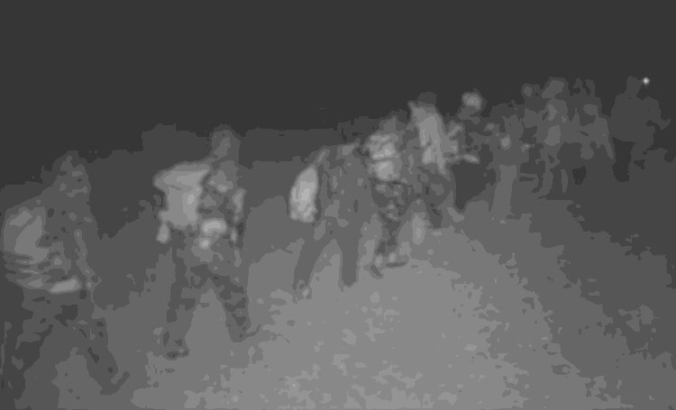 Illegal border crossers who were spotted on surveillance cameras. thecentersquare.com