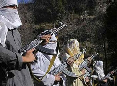 Taliban members wield their weapons. wnd.com