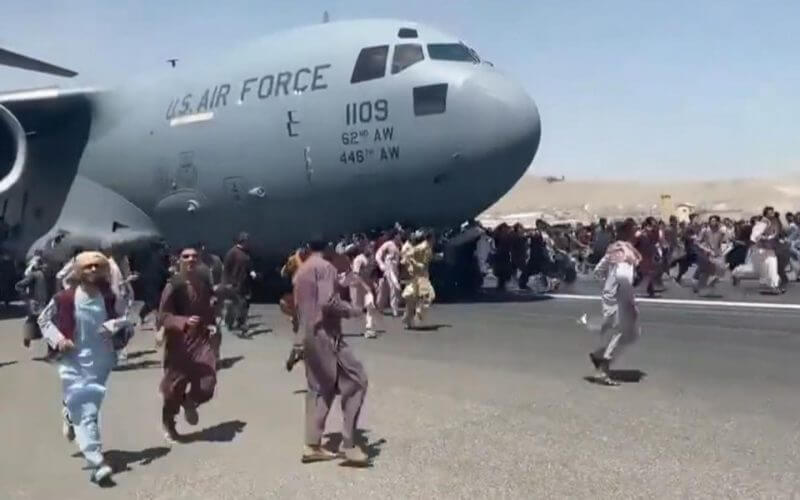 Desperate Afghans clung to plane leaving Taliban-controlled Kabul. news.sky.com