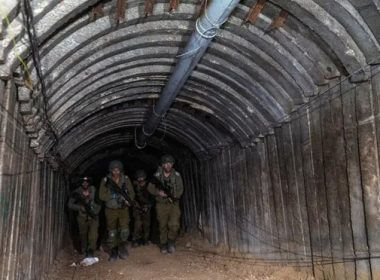 Israeli soldiers walk through the tunnel close to the Erez crossing. Photograph: Amir Cohen/Reuters