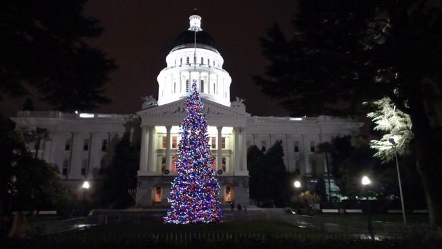 The California State Capitol following a Christmas tree lighting ceremony. Wikimedia Commons