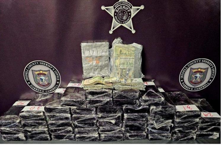 This image was provided by the Iredell County Sheriff's Office. It includes some of the 118 pounds of a substance believed to be fentanyl mixed with cocaine that was bound from Charlotte, N.C., to Pennsylvania before deputies on Sunday, Dec. 10, 2023, stopped a tractor-trailer carrying it on Interstate 77. Iredell County Sheriff's Office