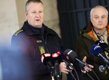 Chief police inspector and operational chief of intelligence service PET, Flemming Drejer (R) and senior police inspector and head of emergency services in Copenhagen Police, Peter Dahl hold a press briefing on a coordinated police action, at the police station in Copenhagen, on December 14, 2023. AFP