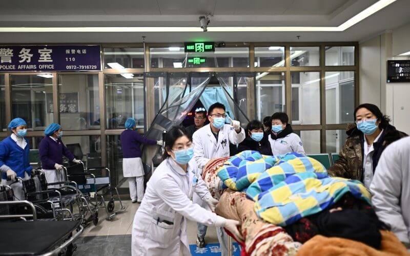 A person injured in an earthquake receives treatment at a hospital in Minhe Hui and Tu Autonomous County of Haidong City, Qinghai Province, China, on Tuesday. Zhang Hongxiang/EPA-EFE/XINHUA