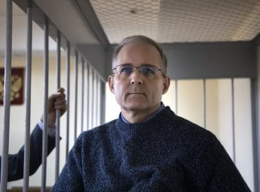 Paul Whelan, a former U.S. marine, who was arrested for alleged spying in Moscow at the end of 2018, stands in a cage while waiting for a hearing in a court room in Moscow. AP
