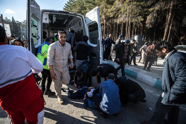 Iranian emergency services arrive at the site where two explosions in quick succession struck a crowd marking the anniversary of the 2020 killing of General Qasem Soleimani on Jan. 3, 2024. AFP