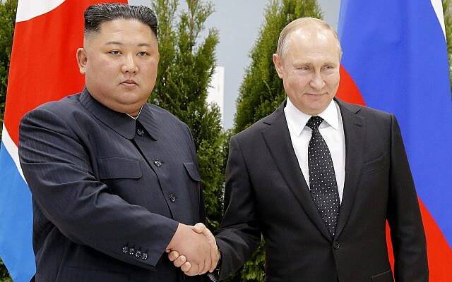 Russian President Vladimir Putin, right, and North Korea's leader Kim Jong Un shake hands during their meeting in Vladivostok, Russia. AP Photo