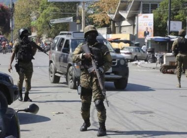 National Palace guards set up a security perimeter after armed gang members tried to seize the palace in Port-au-Prince. AP