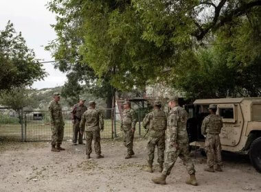 Members of the Texas Guard stationed along the Rio Grande outside of Del Rio. New York Times