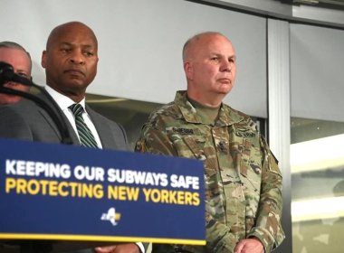 New York State Police Superintendant Steven James, left, and Maj. Gen. Raymond Shields listen as Gov. Kathy Hochul and MTA Chairman and CEO Janno Lieber make a subway safety announcement at the New York City Transit Rail Control Center on Wednesday, Mar 6, 2024. Metropolitan Transportation Authority