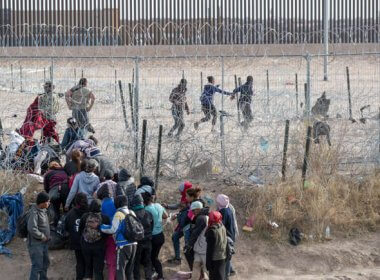 Migrants breach infrastructure set up by the Texas National Guard on the Rio Grande in El Paso, Texas on March 21, 2024. USA Today Network