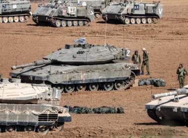 Israeli army Merkava battle tanks and other vehicles deploy along the border with the Gaza Strip. AFP