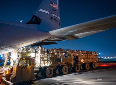 U.S. Airmen load C-130s with humanitarian aid bound for Gaza. Senior Airman Lauren Jacoby