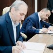 National Iranian Gas Company CEO Majid Chegeni (left) and Iraq's Ministry of Electricity Ziad Ali Fadhel signing a five-year barter deal in Baghdad on March 27, 2024. iranintl.com