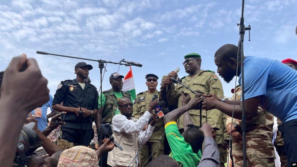 Mohamed Toumba, one of the soldiers who ousted Nigerian President Mohamed Bazoum, addresses supporters of Niger's ruling junta in Niamey, Niger, Aug. 6, 2023. AP