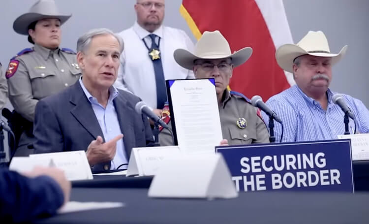 Texas Gov. Greg Abbott with members of the Department of Public Safety. Texas Governor's Office