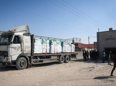 A truck carrying humanitarian aid arrives for processing at the Kerem Shalom border crossing with Gaza on April 15, 2024. AFP