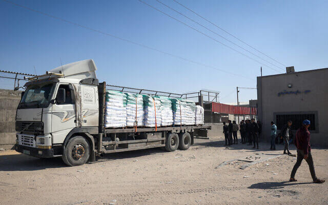 A truck carrying humanitarian aid arrives for processing at the Kerem Shalom border crossing with Gaza on April 15, 2024. AFP