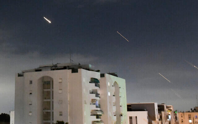 Israeli air defense systems intercept missiles fired from Iran, in central Israel, April 14, 2024. AP