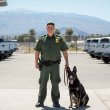 Custom Border Patrol officer in El Centro, California with CBP K-9 officer | U.S. Custom Border Patrol