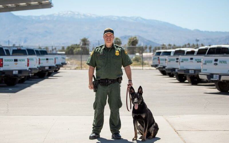 Custom Border Patrol officer in El Centro, California with CBP K-9 officer | U.S. Custom Border Patrol