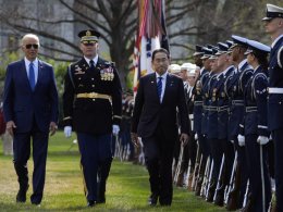 President Joe Biden and Japanese Prime Minister Fumio Kishida review the troops with Col. David Rowland, commander of the 3rd U.S. Infantry Regiment, The Old Guard, during a State Arrival Ceremony on the South Lawn of the White House, Wednesday, April 10, 2024, in Washington. AP