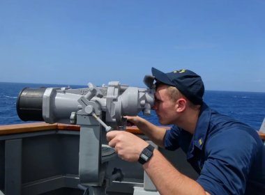 A sailor aboard the U.S. Navy guided-missile destroyer USS Spruance investigated a contact during a Taiwan Strait transit. U.S. Navy