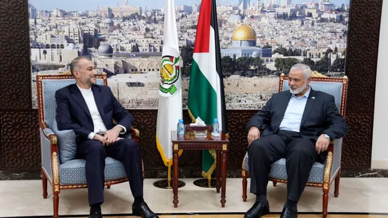 In this picture released by the Iranian Foreign Ministry, Iran's Foreign Minister Hossein Amirabdollahian, left, meets with Ismail Haniyeh of Hamas, in Doha, Qatar on Oct. 14, 2023. AP