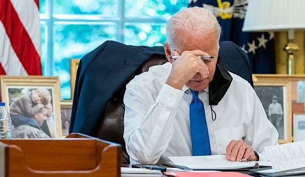 Joe Biden reviews remarks he will deliver about the situation in Afghanistan, Thursday, Aug. 19, 2021, in the Oval Office of the White House. (Official White House photo by Erin Scott)