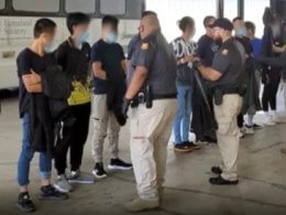 Chinese nationals detained at the U.S-Mexico border. dhs.gov