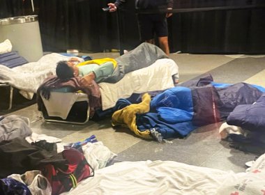Migrants and migrant bedding inside O'Hare International Airport in Chicago. Dan McCaleb | The Center Square