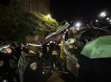 California police attempting to break through protestors to clear out a pro-Palestine encampment before sunrise on May 2, 2024. Anthony Cabassa